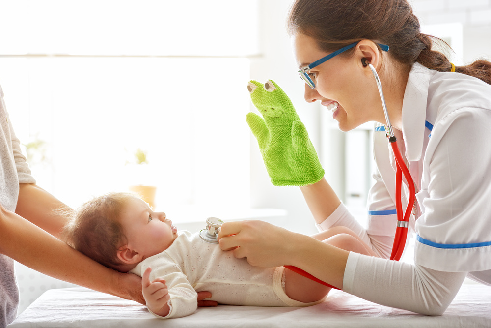 pediatrician with newborn