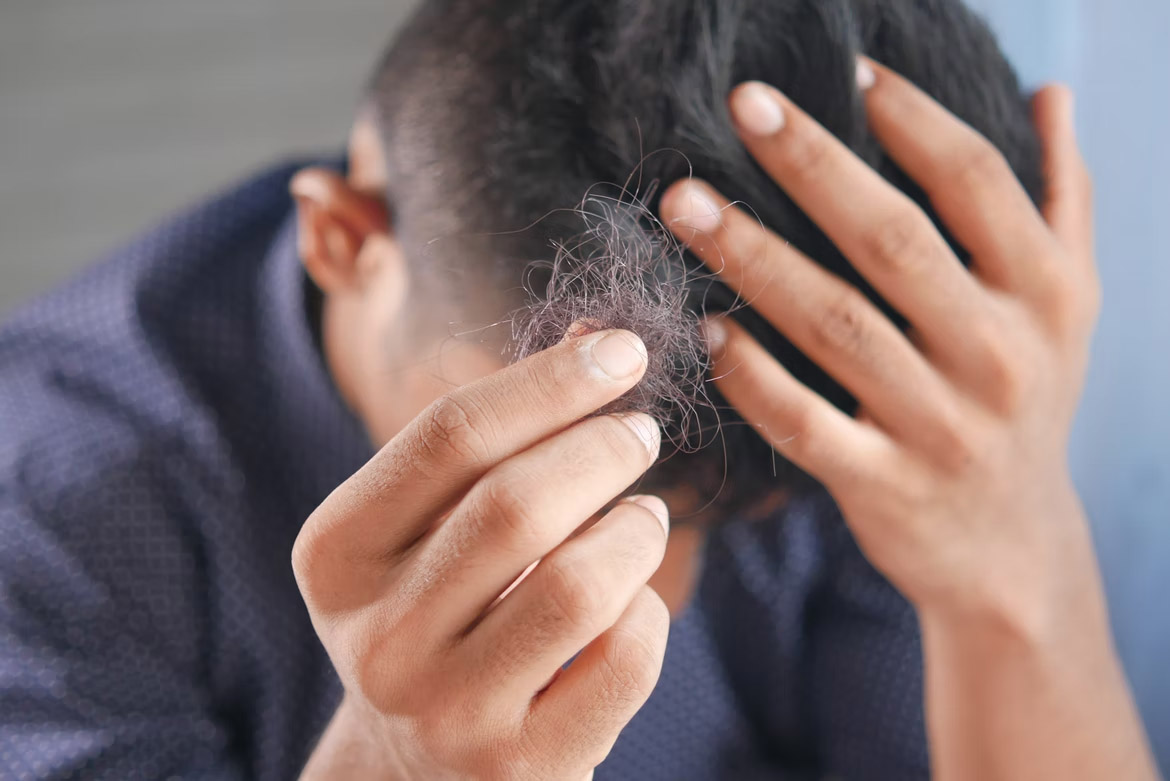 Can Xarelto cause hair loss and dry skin conditions?