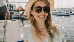 smiling girl with sunglasses