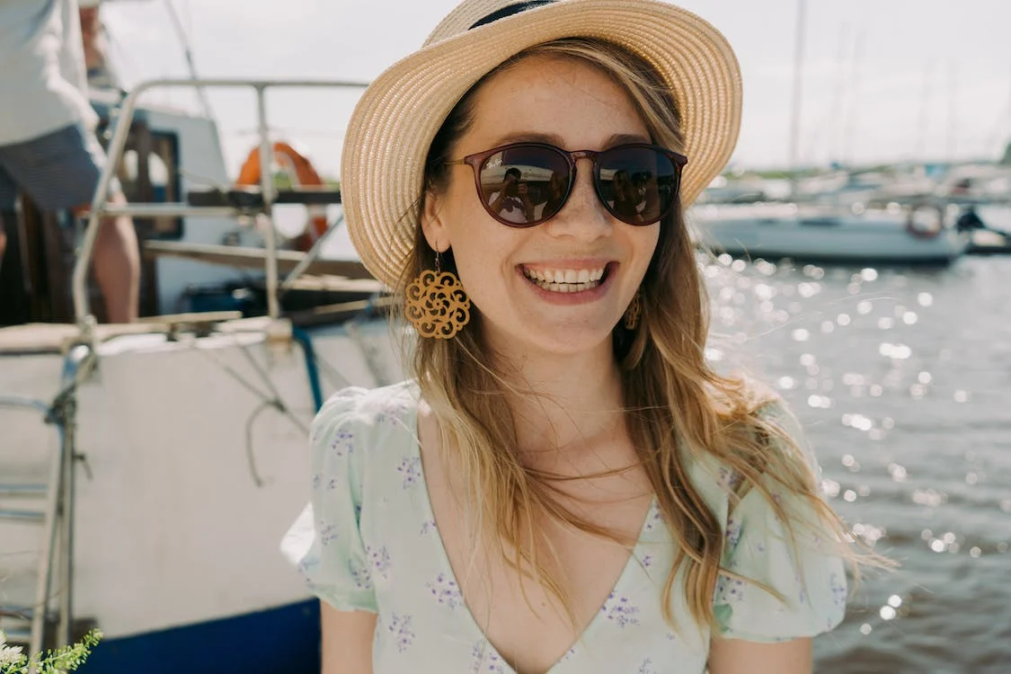 smiling girl with sunglasses