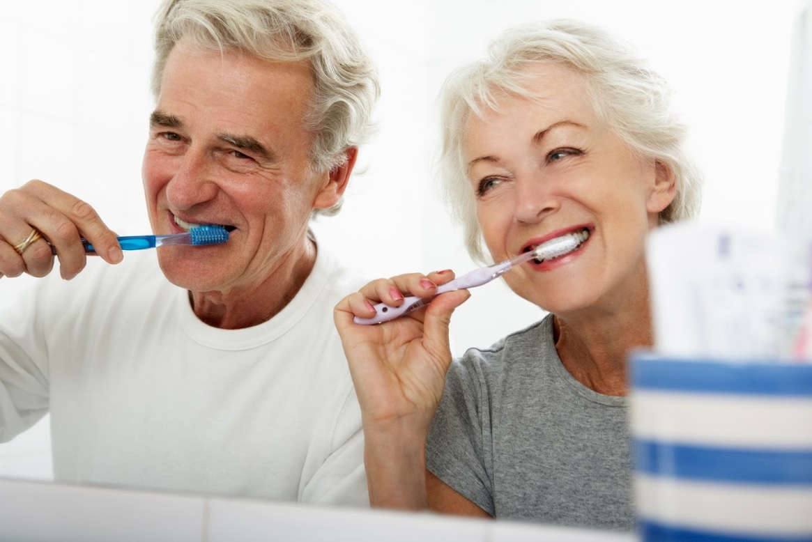 elderly brushing teeth