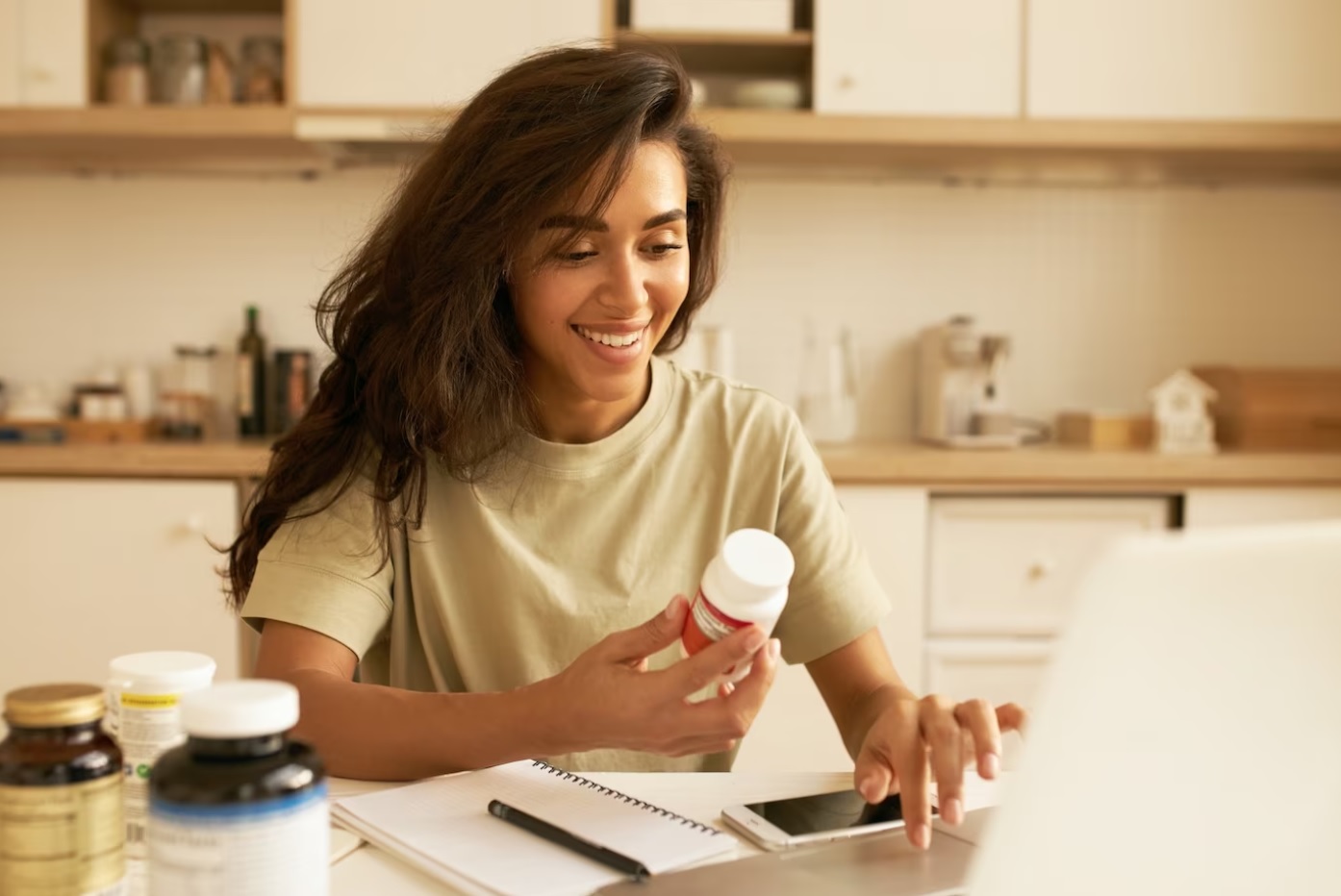 girl with supplements smiling