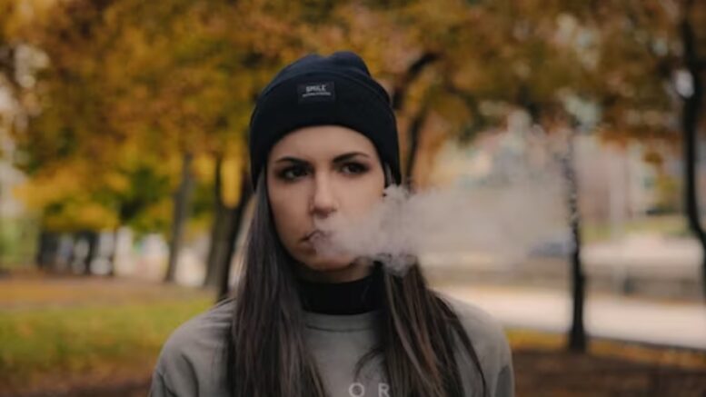 smoking girl in the park