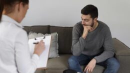 Man talking with doctor