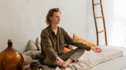 meditating man in bed